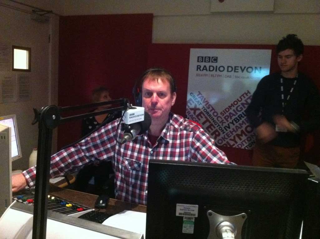 John Govier behind the microphone on BBC Radio Devon