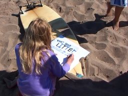 The Groms write letters and make posters for the SAS campaign