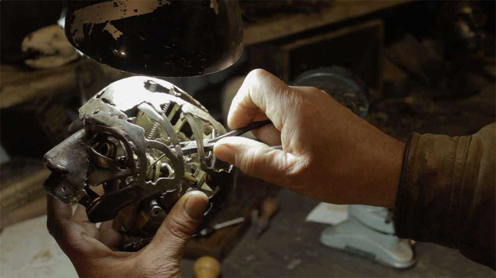 Andrew seen building the clockwork AI in his studiio in Devon